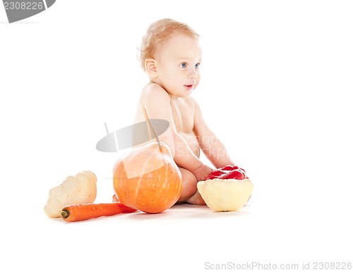 Image of baby boy with vegetables