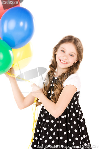 Image of happy girl with colorful balloons