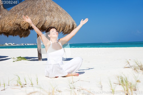 Image of meditation on the beach