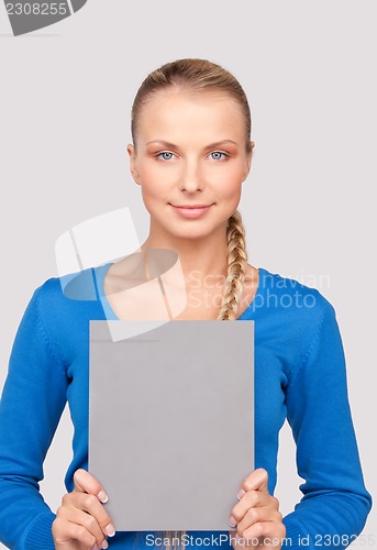 Image of happy woman with blank board 