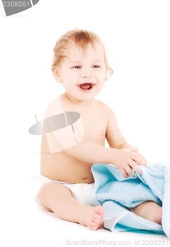 Image of baby with blue towel