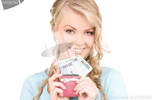 Image of lovely woman with purse and money