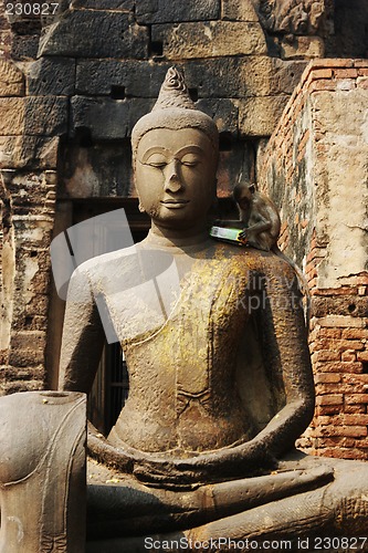 Image of Monkey on a Buddhist statue in Thailand