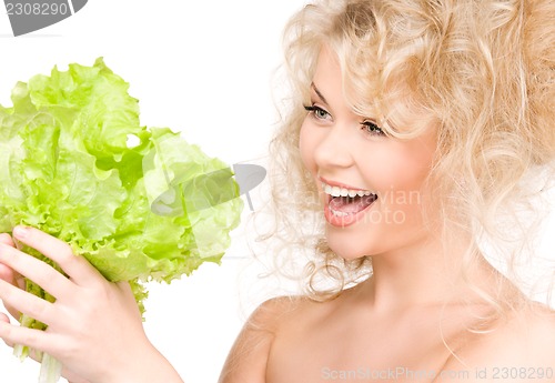 Image of happy woman with lettuce