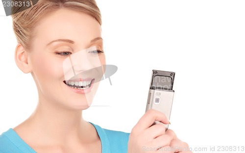 Image of happy woman with cell phone