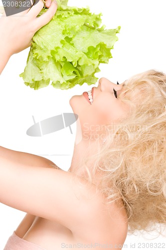 Image of happy woman with lettuce