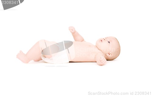 Image of laying baby boy in diaper