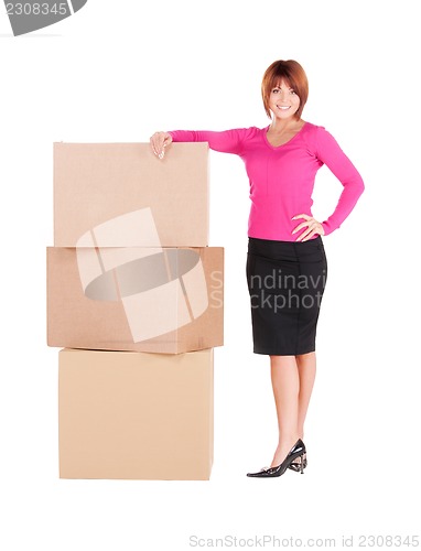 Image of businesswoman with boxes