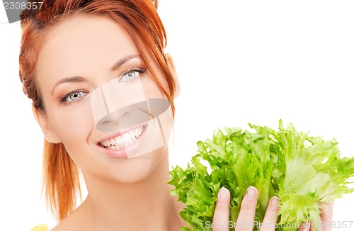 Image of happy woman with lettuce