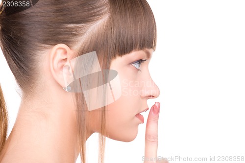 Image of finger on lips