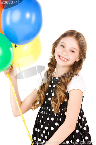 Image of happy girl with colorful balloons