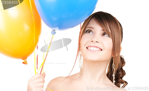 Image of happy teenage girl with balloons