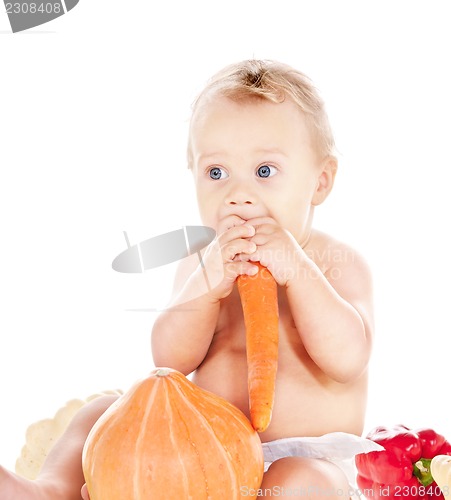 Image of baby boy with vegetables