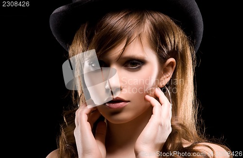 Image of woman in top hat