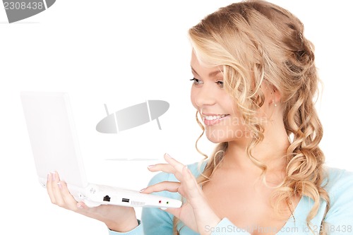 Image of happy woman with laptop computer