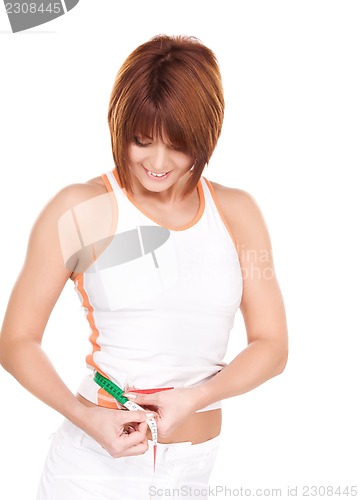 Image of beautiful woman with measure tape