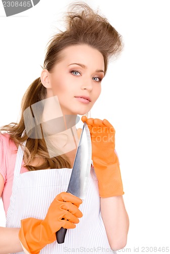 Image of housewife with big knife