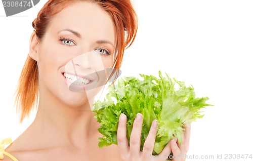 Image of happy woman with lettuce