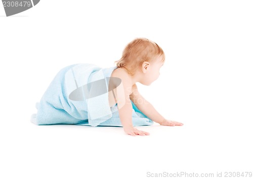 Image of baby with blue towel