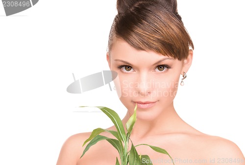 Image of woman with sprout