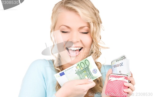 Image of lovely woman with purse and money