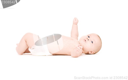 Image of laying baby boy in diaper