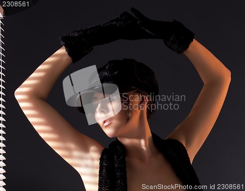 Image of woman in black astrakhan