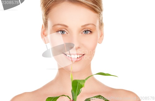 Image of woman with sprout