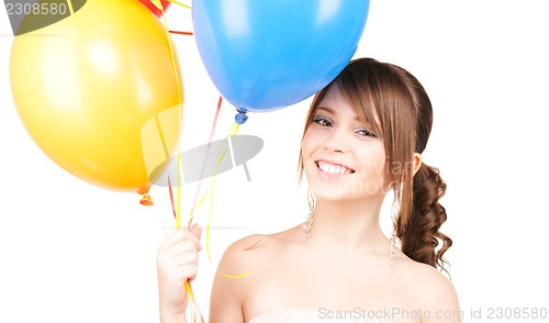 Image of happy teenage girl with balloons