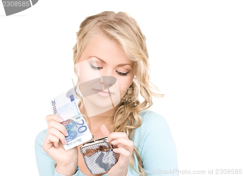 Image of lovely woman with purse and money