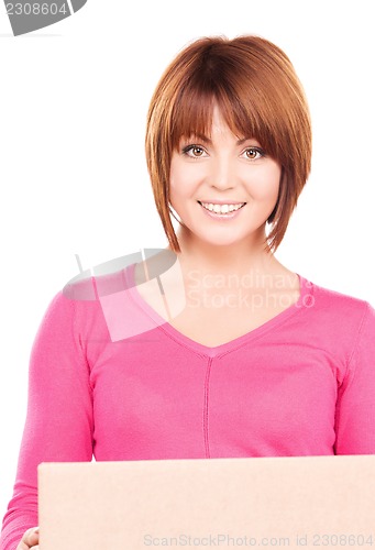 Image of businesswoman with parcel