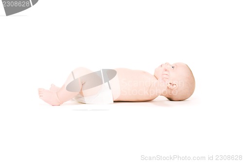 Image of laying baby boy in diaper