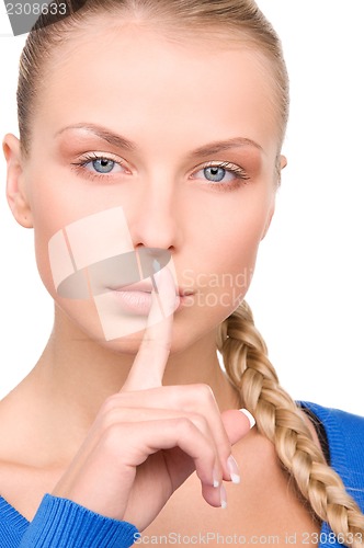 Image of finger on lips