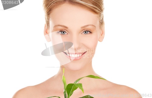 Image of woman with sprout