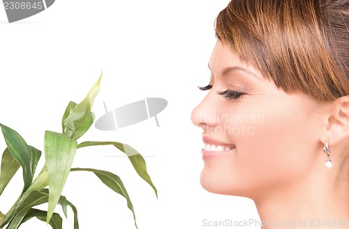 Image of woman with sprout