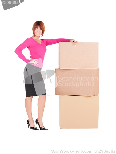 Image of businesswoman with boxes