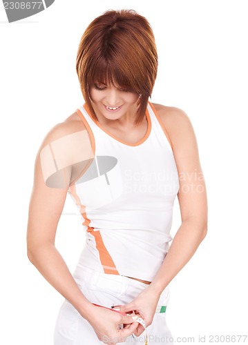 Image of beautiful woman with measure tape