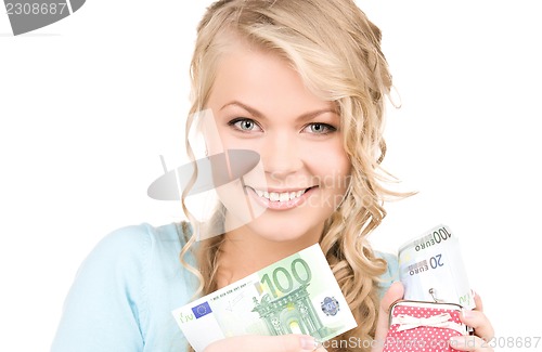 Image of lovely woman with purse and money