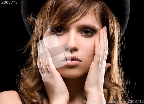 Image of woman in top hat