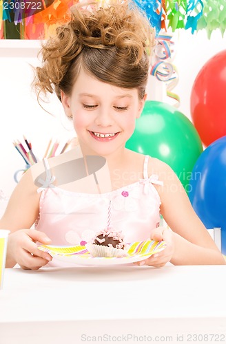 Image of party girl with cake