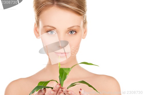 Image of woman with sprout