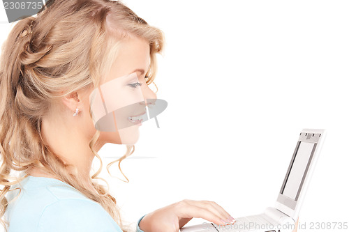 Image of happy woman with laptop computer