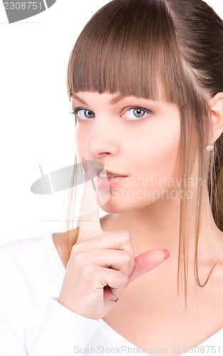 Image of finger on lips