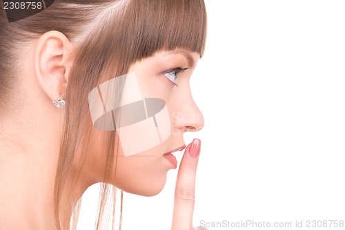 Image of finger on lips