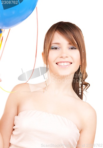 Image of happy teenage girl with balloons