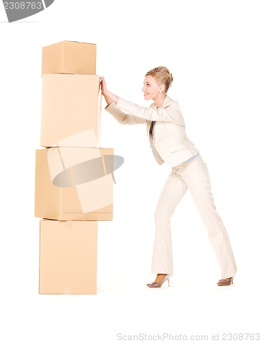 Image of businesswoman with boxes