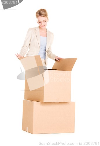 Image of businesswoman with boxes