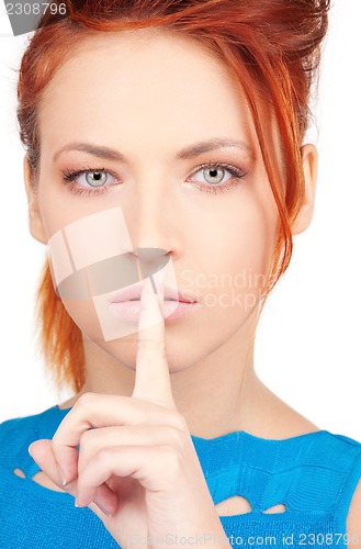 Image of finger on lips
