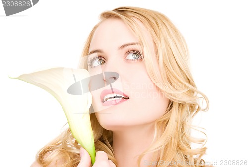 Image of beautiful woman with white flower