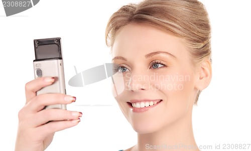 Image of happy woman with cell phone